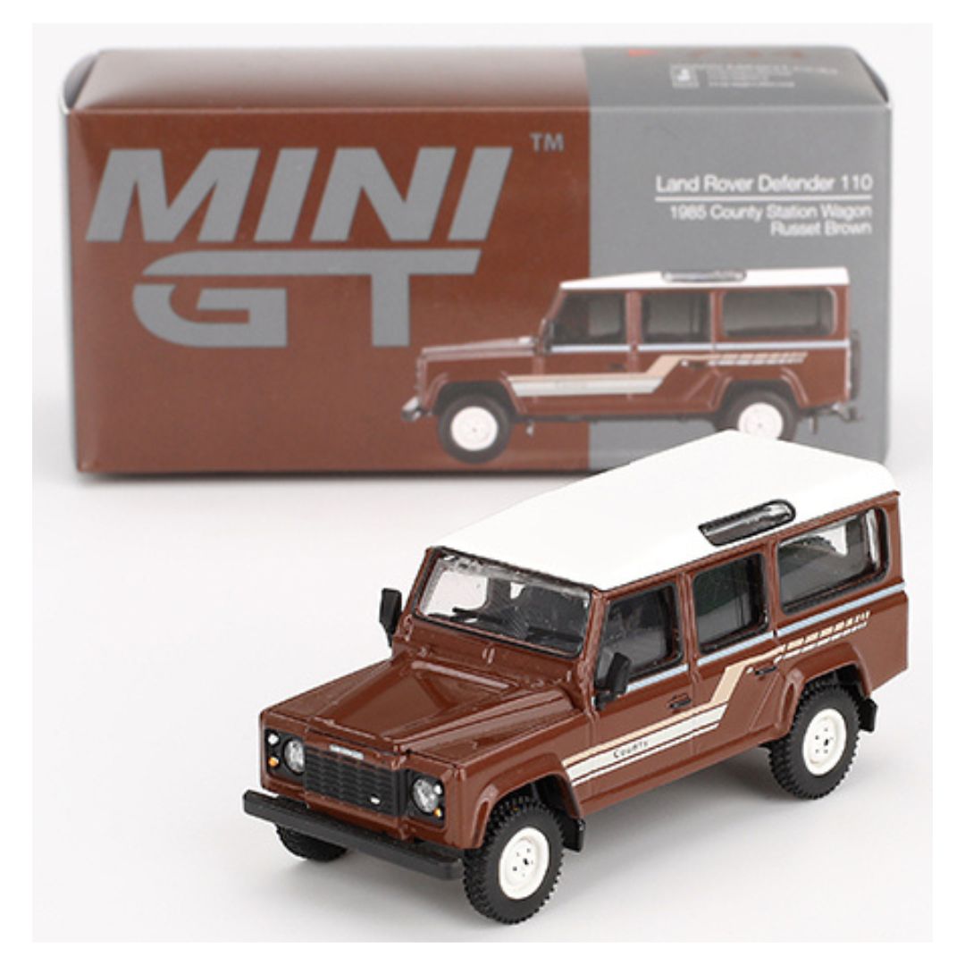 Mini GT #734: Land Rover Defender 110 1985 County Station Wagon Russet Brown 1:64