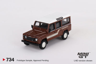 Mini GT #734: Land Rover Defender 110 1985 County Station Wagon Russet Brown 1:64