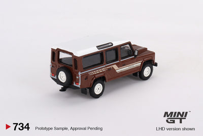 Mini GT #734: Land Rover Defender 110 1985 County Station Wagon Russet Brown 1:64