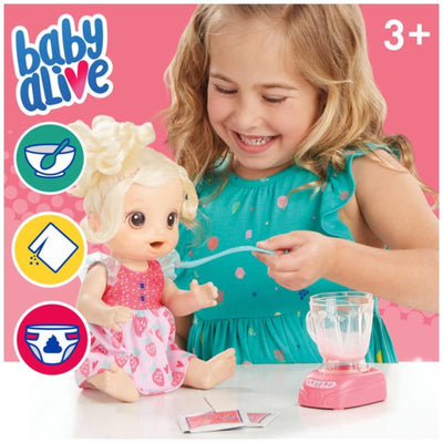 Baby Alive Magical Mixer Baby Doll image showing girl feeding doll with a spoon
